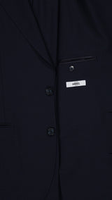Détail tissu de la veste du costume droit Stefano en fresco bleu marine - photographié à l'intérieur - Collection Printemps Été 2026 - Maison Gabriel Paris