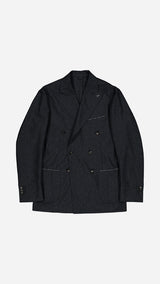 La veste du costume croisé Constant en flanelle de laine gris anthracite - photographiée à plat vue de haut - Collection Automne Hiver 2025 par Maison Gabriel Paris