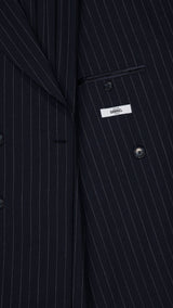 Détail tissu de la veste du costume croisé Serge en fresco à rayures tennis bleu - photographié à l'intérieur - Collection Printemps Été 2026 - Maison Gabriel Paris