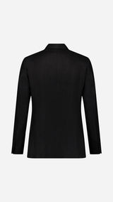 La veste du costume croisé Titouan en lin irlandais coloris noir - photographiée en ghost vue de dos - Collection Printemps Été 2025 par Maison Gabriel Paris