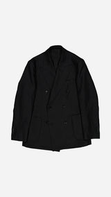 La veste du costume croisé Titouan en lin irlandais coloris noir - photographiée à plat vue de haut - Collection Printemps Été 2025 par Maison Gabriel Paris