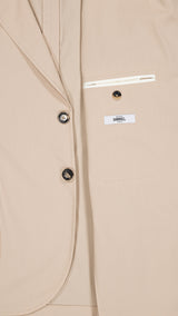 Détail tissu de la veste du costume droit Cary en coton coloris beige - photographié à l'intérieur - Collection Printemps Été 2026 - Maison Gabriel Paris