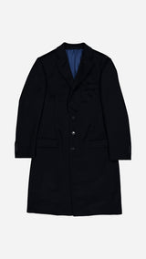 Le manteau Hannibal en laine et cachemire bleu marine - photographiée à plat vue de haut - Collection Automne Hiver 2025 par Maison Gabriel Paris