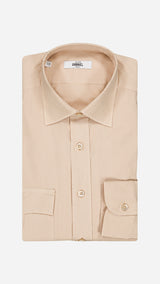 Chemise Diego : la popeline de coton lavée coloris sable - photographiée pliée vue de haut - Collection Printemps Ete 2026 - Maison Gabriel Paris