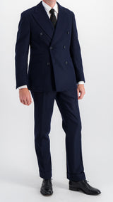 Costume croisé André en flanelle bleu marine par Maison Gabriel Paris, collection André Malraux porté côté