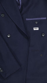 Costume croisé André en flanelle bleu marine par Maison Gabriel Paris, collection André Malraux détail tissu avec broderie Malraux intérieur