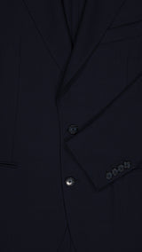 Détail tissu de la veste du costume droit Stefano en fresco bleu marine - photographié de face - Collection Printemps Été 2026  - Maison Gabriel Paris