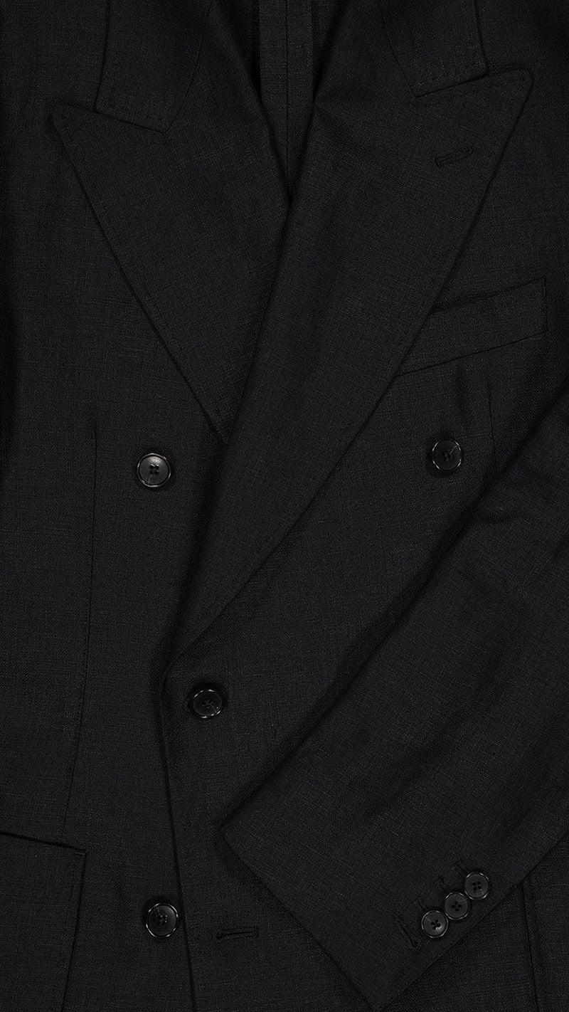 Détail tissu de la veste du costume croisé Titouan en lin irlandais coloris noir - photographiée de face - Collection Printemps Été 2025 par Maison Gabriel Paris