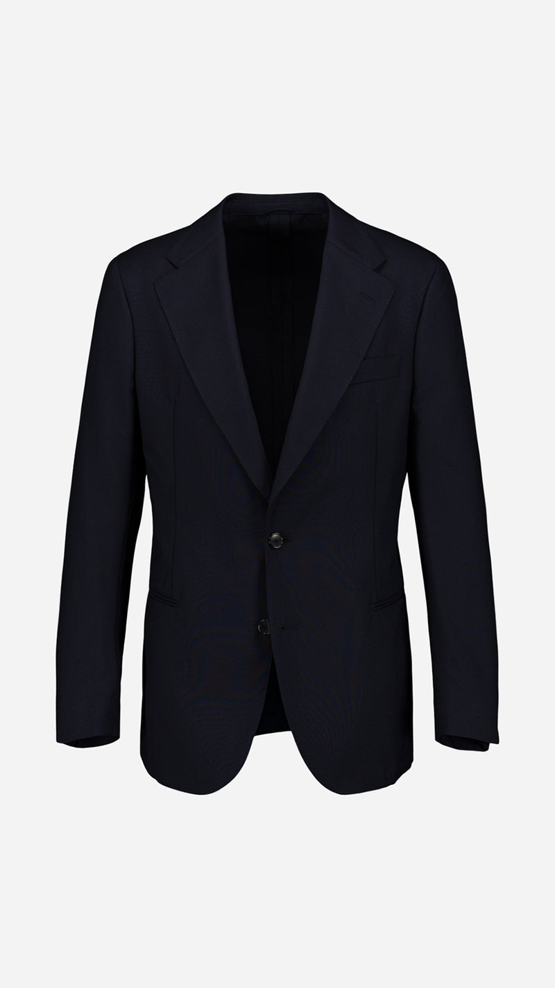 La veste du costume droit Stéphane en fresco bleu nuit, photographiée en ghost vue de face de la Maison Gabriel Paris