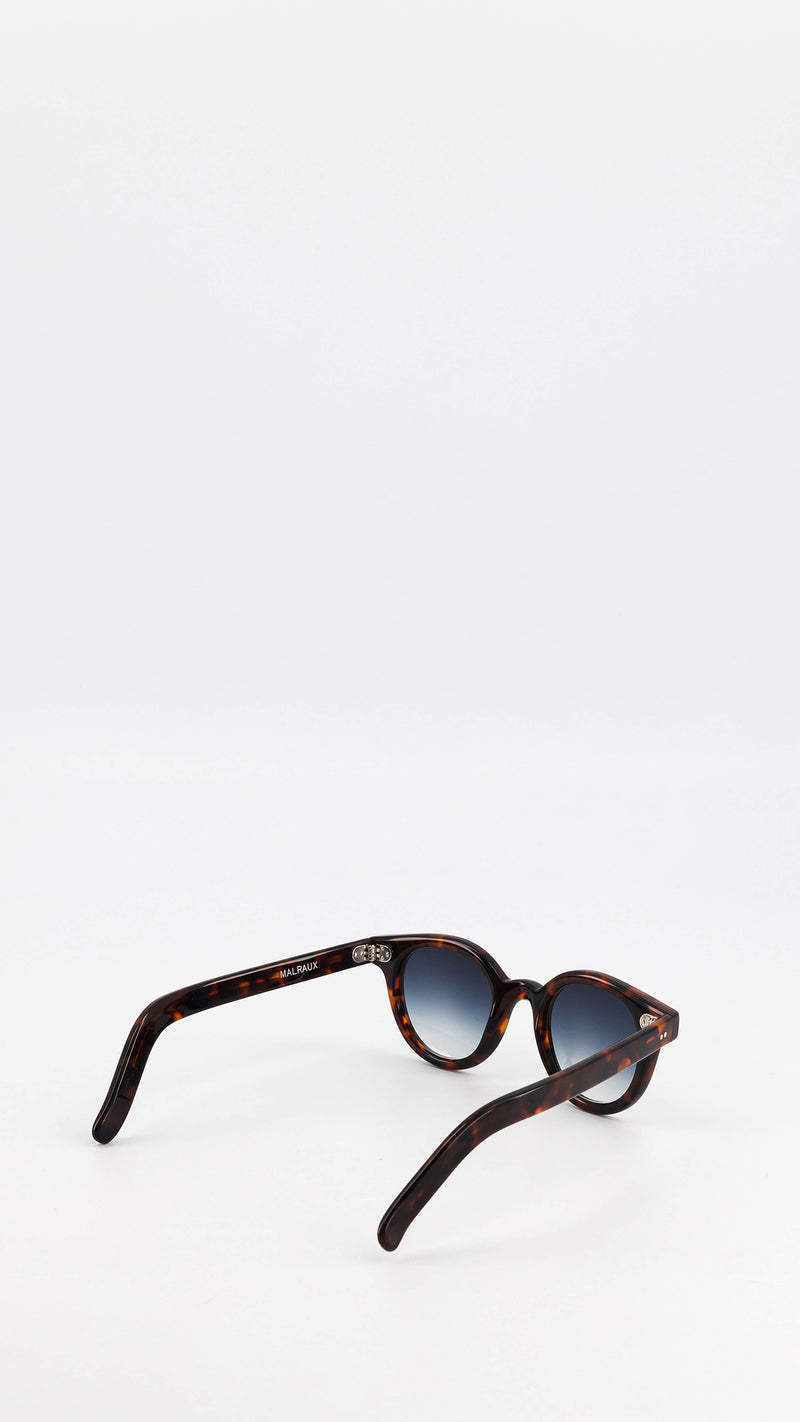 Les lunettes Vincent en acétate marron jaspé verres solaires dégradés, coloris bleu gris, de la collection André Malraux par Maison Gabriel Paris