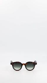 Les lunettes Vincent en acétate marron jaspé verres solaires dégradés, coloris vert, de la collection André Malraux par Maison Gabriel Paris
