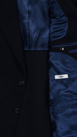 La veste droite Orso en laine et cachemire bleu marine - zoom tissu intérieur - Collection Automne Hiver 2025 - Maison Gabriel Paris 